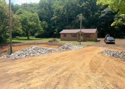 Freshly cleared and graded for a residential driveway