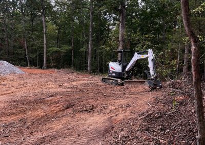 Site clearing and rough grading before building pad construction